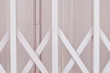 Pink metal grille sliding door