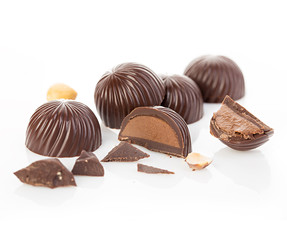Chocolate candies close-up isolated on a white background.