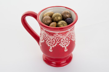 Chocolate and candies in a christmas mug for Christmas