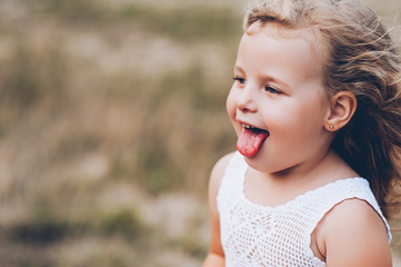 emotional child girl outdoors