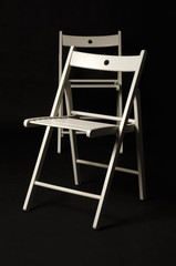 Two white chairs