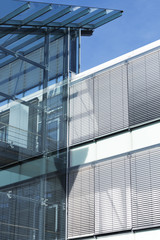 Fototapeta na wymiar Modern glass building, toned image