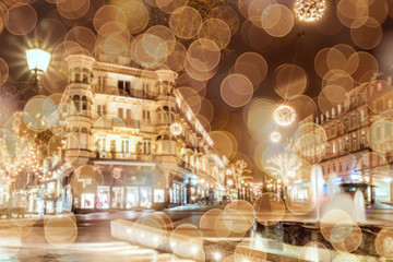 Historic center of Baden-Baden with Christmas lighting.  Blur ba