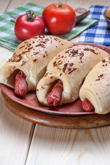 Sausage baked in dough.