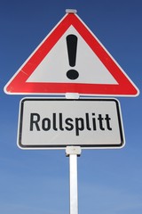 Deutsches Verkehrszeichen: Gefahrstelle, Rollsplitt