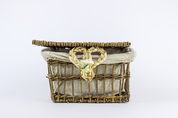 Rattan wooden box on a white background