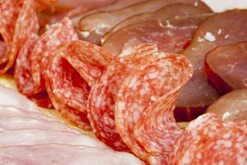 Salami sausage slicesand ham