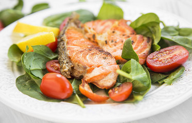 Grilled Salmon with Spinach and Tomatoes Salad,Selective Focus