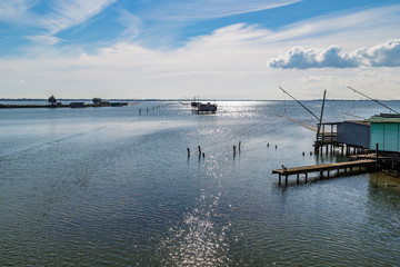 Obraz premium fishing huts with netfish