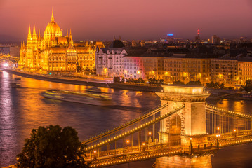 Naklejka na ściany i meble Aerial night view of Budapest, Hungary in the sunset