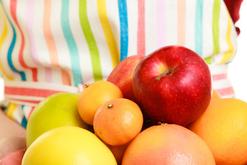 housewife or seller offering healthy fruits isolated