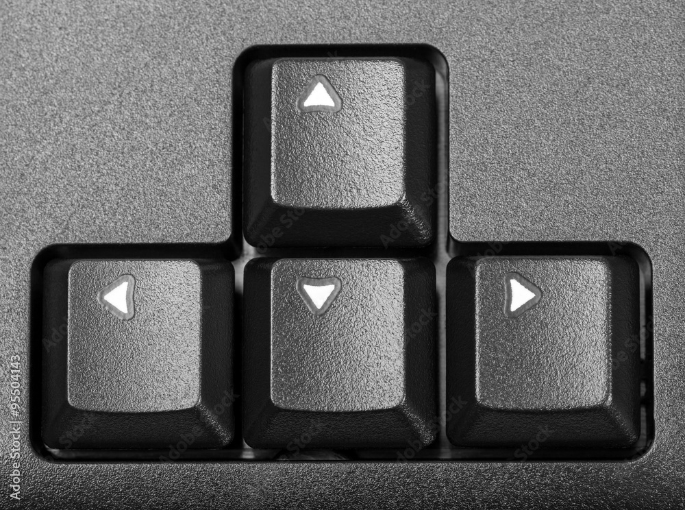 Fototapete Electronic collection - block arrows on the computer keyboard