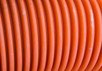 corrugated plastic pipe of orange color