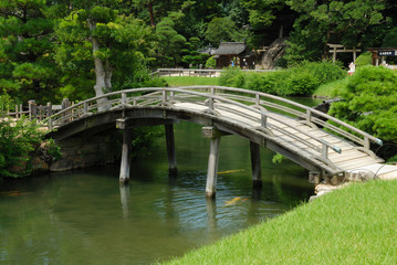 Fototapeta na wymiar Bridge in Korakuen garden in Okayama, Japan