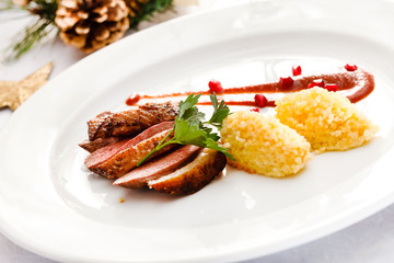 roasted duck breast on Christmas table