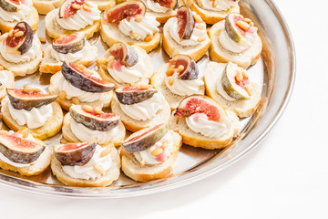 canape with cream cheese and fig
