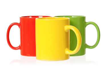 Three colorful mugs for coffee or tea
