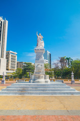 Naklejka premium Noli Me Tangere sculpture in the beautiful streets in Cartagena, Colombia
