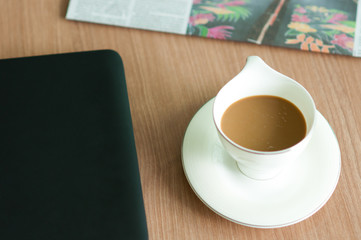 coffee notebook newspaper