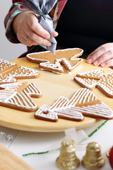 Decorating gingerbread cookies.