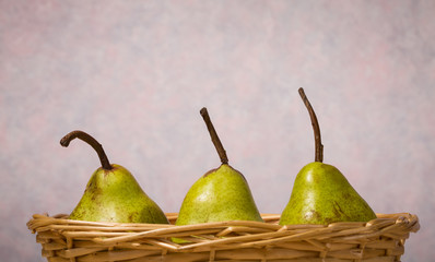 three pears in a basket