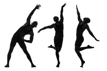 Silhouettes of dancers in dancing concept