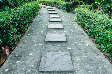 Stone paving in garden.