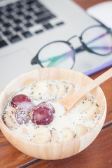 Granola with fruits on work station