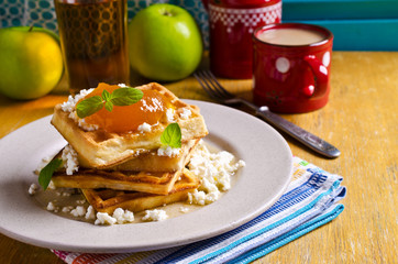 Waffles with jam and ricotta
