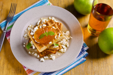 Waffles with jam and ricotta