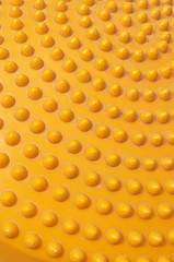 Abstract dotted orange plastic background