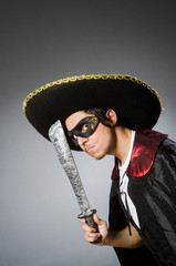 Person wearing sombrero hat in funny concept
