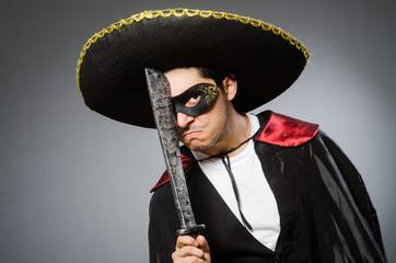 Person wearing sombrero hat in funny concept