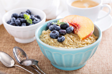 Breakfast quinoa porridge with fresh fruits