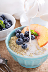 Breakfast quinoa porridge with fresh fruits