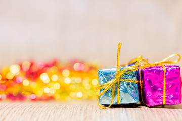 Christmas background with gift boxes on soft background