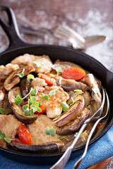 Chicken with tomatoes and eggplant