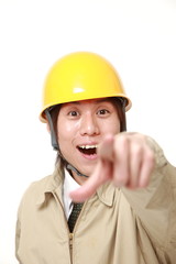 young Japanese construction worker discover something