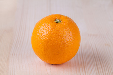 fresh orange on wood