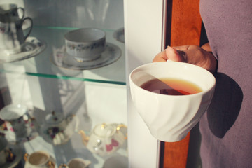 Woman drinking hot tea