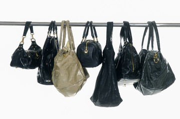 Set of different bag for females on hangers