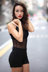 Portrait of beautyful girl in urban background