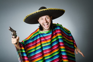 Mexican with gun wearing sombrero