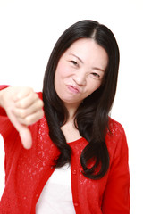 woman with thumbs down gesture
