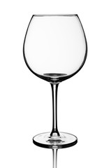 Empty red wine glass isolated over white background
