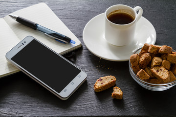 Business break - coffee cookies and notepad