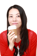 Japanese woman takes a coffee break