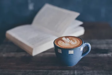 Zelfklevend Fotobehang coffee latte and book © chayathon2000