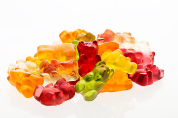Heap of jelly bears or gummy bears candies isolated on white