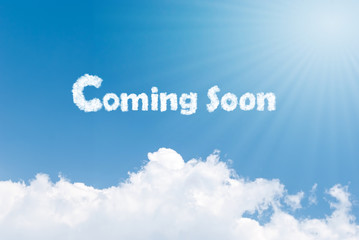 Blue sky background with coming soon clouds word